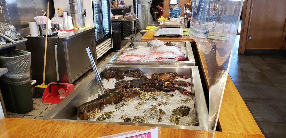 Seafood plates on a casual dining table.