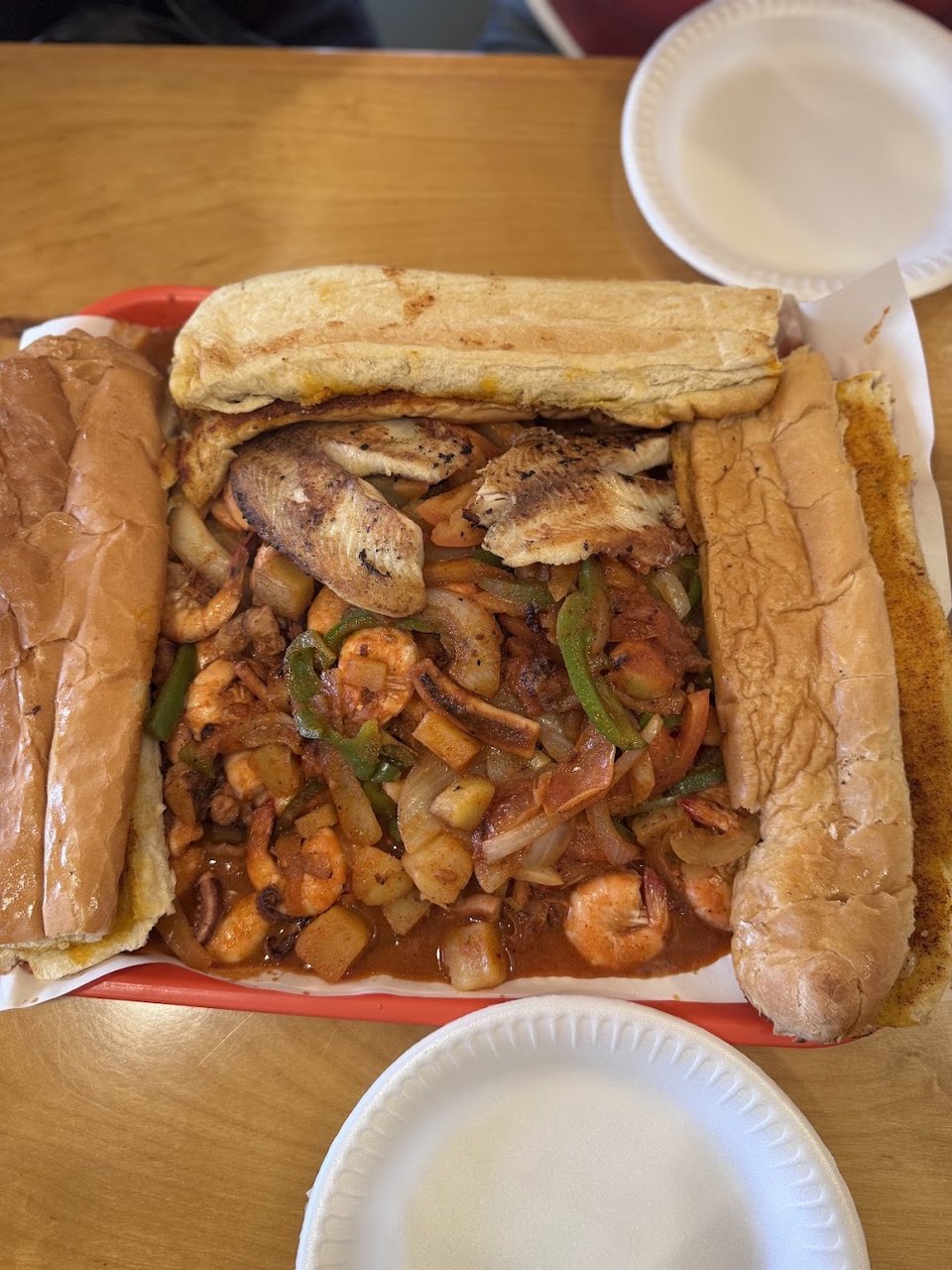 Printed seafood menu with shrimp and soup sections.