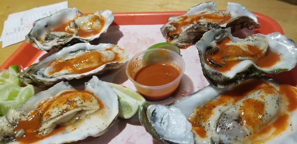 Seafood restaurant menu with shrimp fajitas and clam chowder.