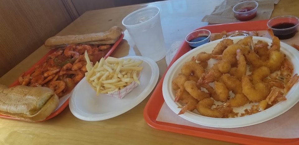 Seafood restaurant menu with shrimp fajitas and clam chowder.